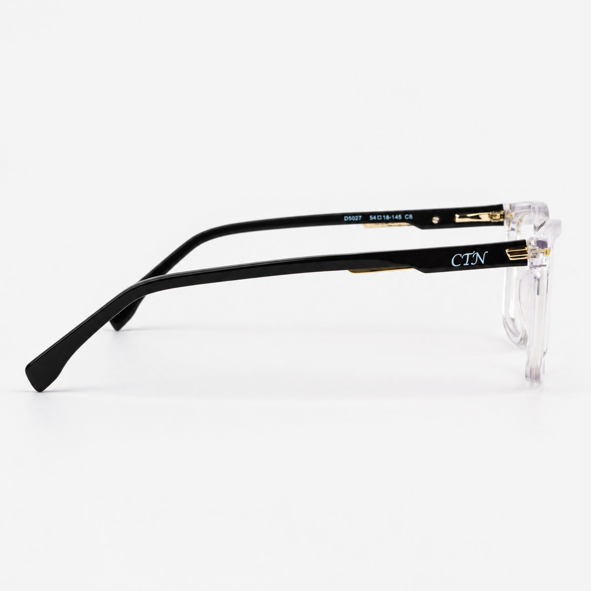 Perfil lateral montura acetato negro mostrando apliques metalicos incrustados Piclek