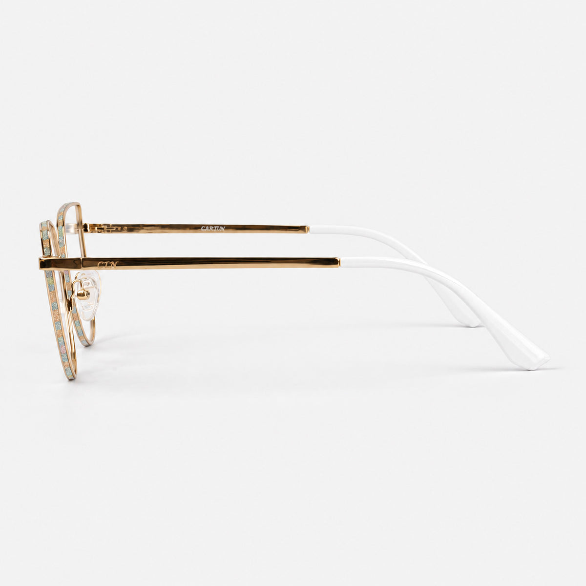 Perfil lateral de gafas de descanso mostrando varilla metalica dorada y terminal blanca Piclek