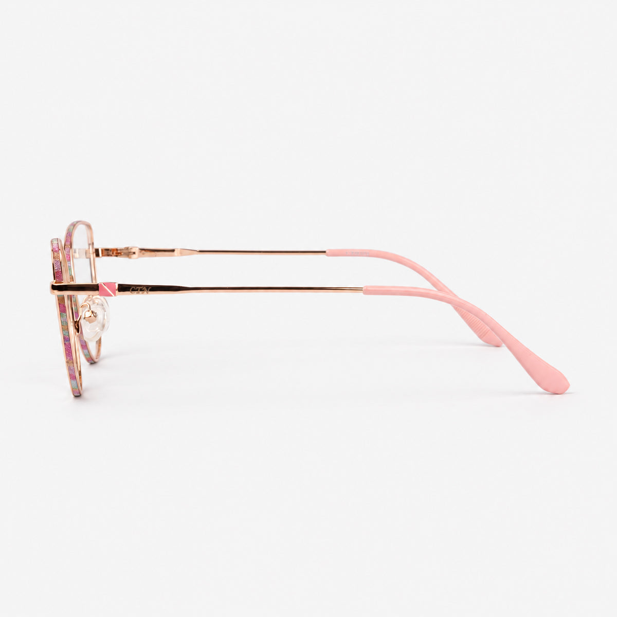 Perfil lateral de gafas de descanso mostrando varilla metalica dorada y terminal rosa Piclek