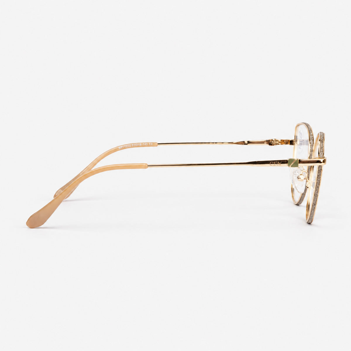 Perfil lateral de gafas de descanso mostrando varilla metalica dorada y terminal beige Piclek