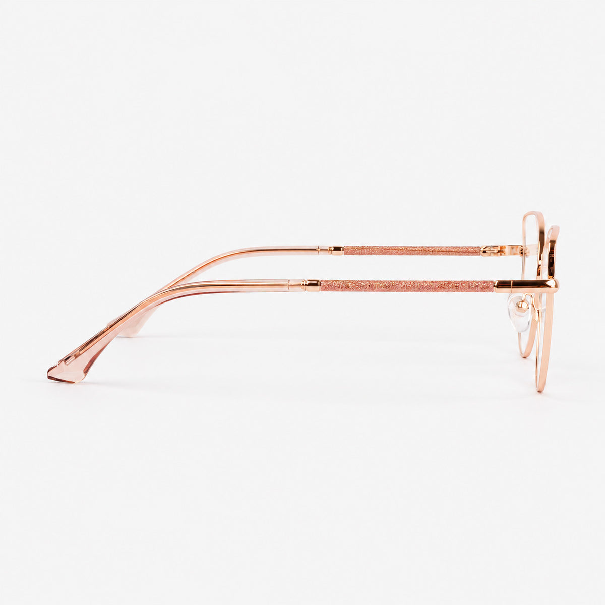 Perfil lateral de gafas de descanso mostrando detalle de varilla glitter oro rosa y terminal transparente rosado Piclek