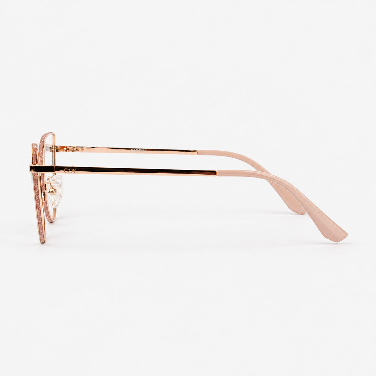 Perfil lateral de gafas de descanso mostrando varilla metalica oro rosa y terminal beige Piclek