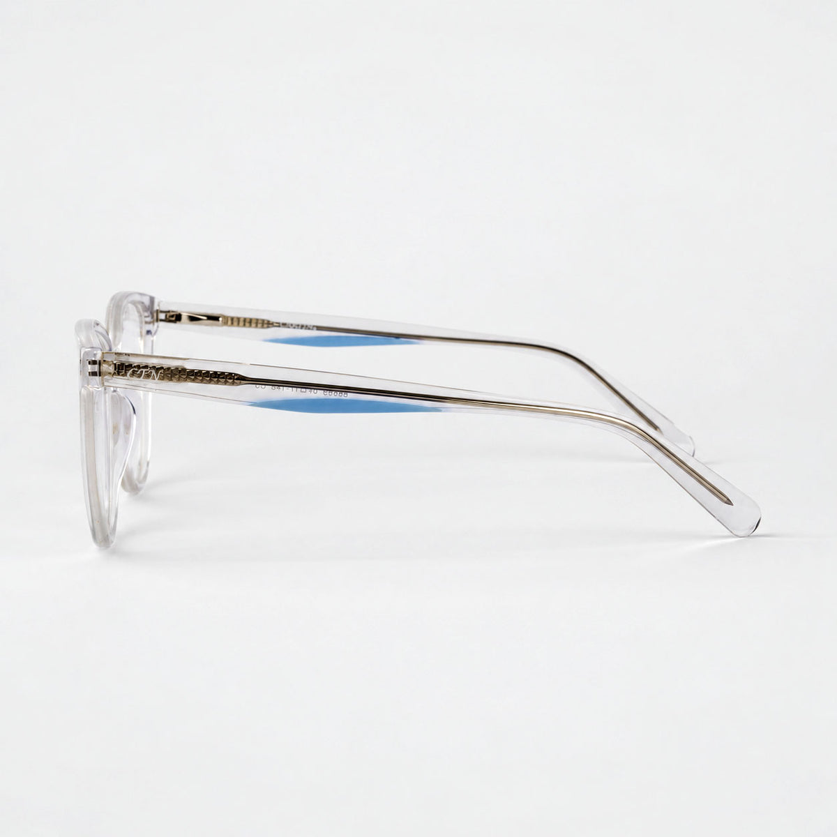 Perfil lateral de montura transparente mostrando alma metalica y toque azul Piclek