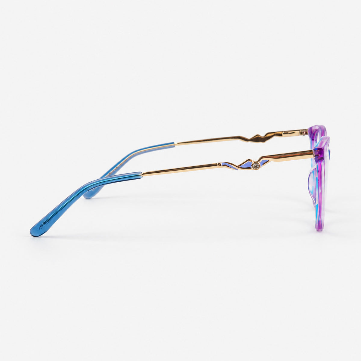 Perfil lateral de montura morada mostrando varilla dorada labrada con aplique tipo joya Piclek